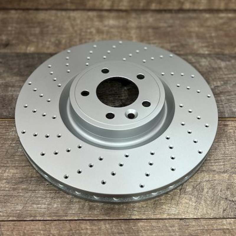 Диск гальмівний передній R1 CONCEPTS CARBON GEOMET перфорація для LR RR LR016176 380/34 Диск гальмівний передній R1 CONCEPTS CARBON GEOMET перфорація для LR RR LR016176 380/34